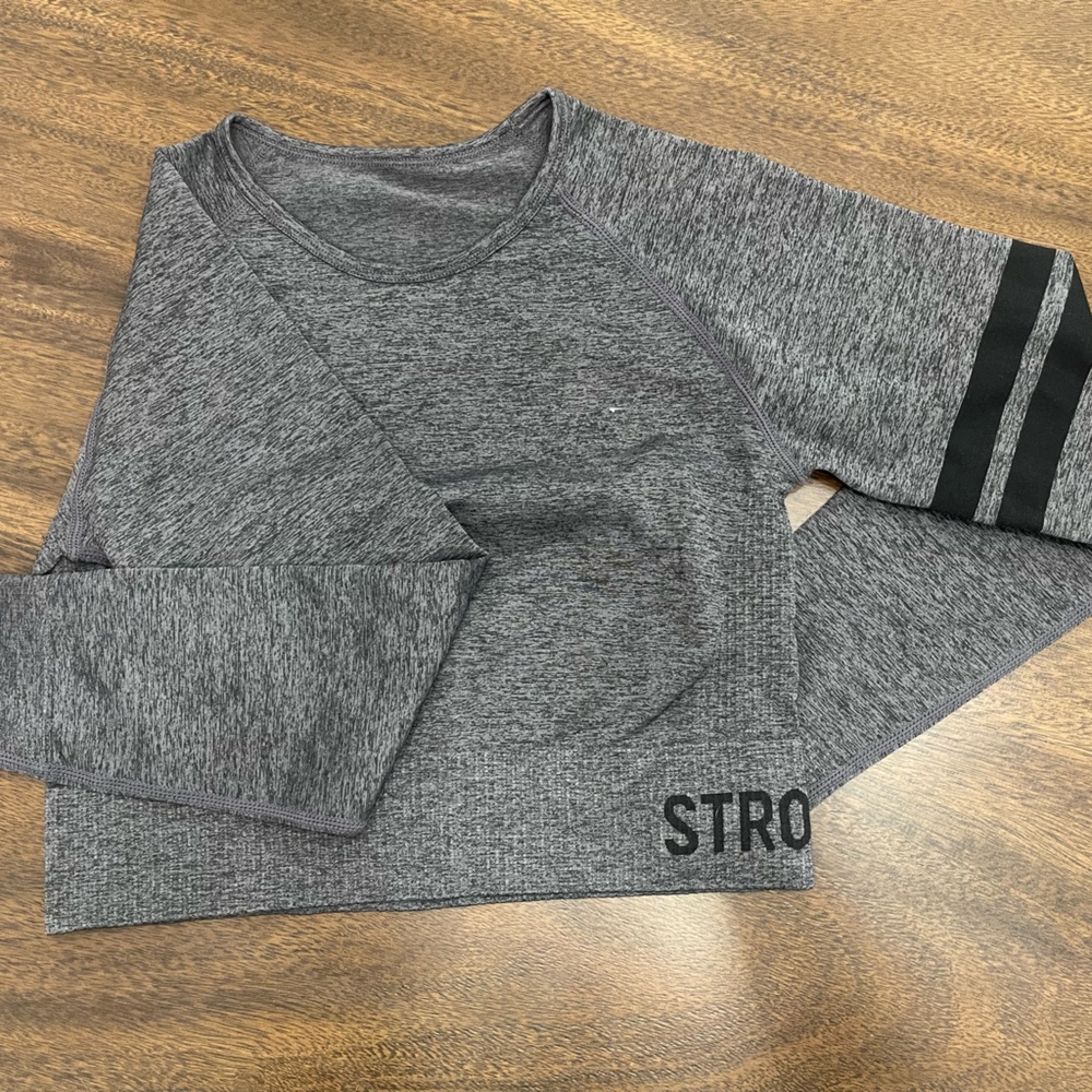 Stronger (designed in Sweden) Crop top with a long sleeve.